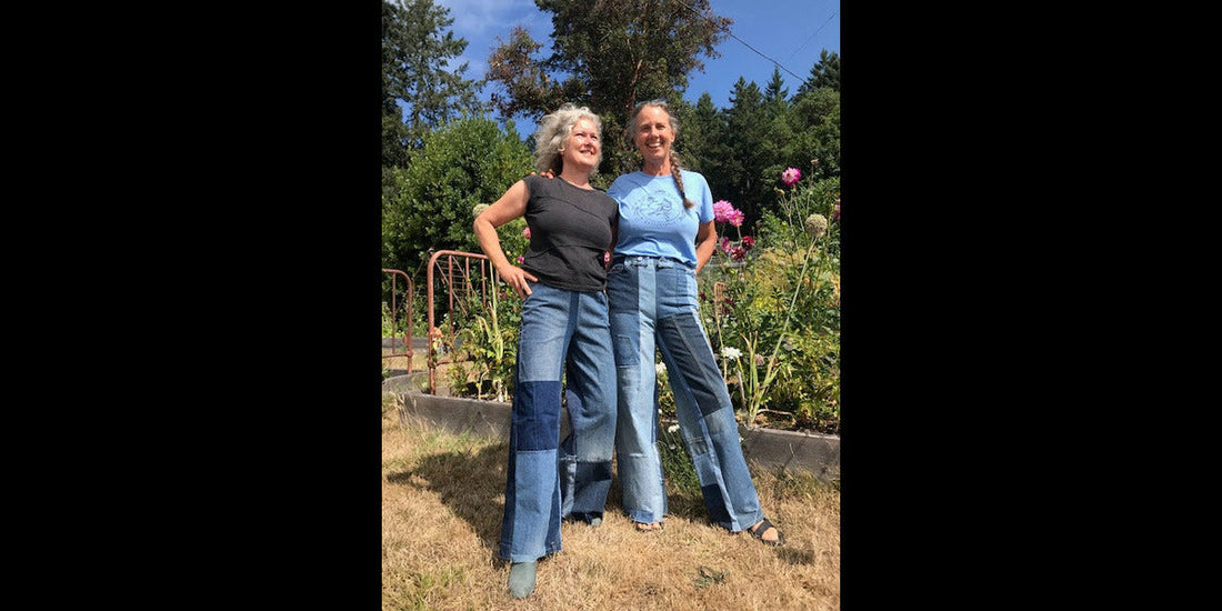 Two women wearing upcycled jeans by Heke Design